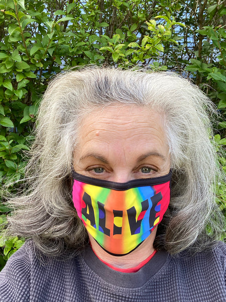 Deborah Kass wearing her ALIVE mask. Photo courtesy of the artist.
